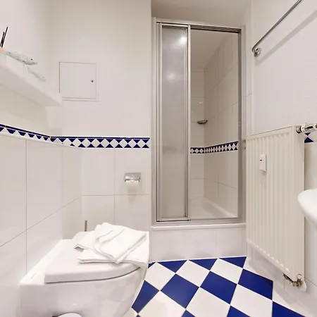 Апартаменты Direkt Am Strand, Freia 03 Остзебад Бинц